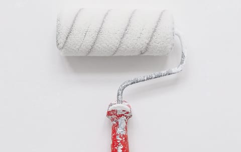 white paint roller